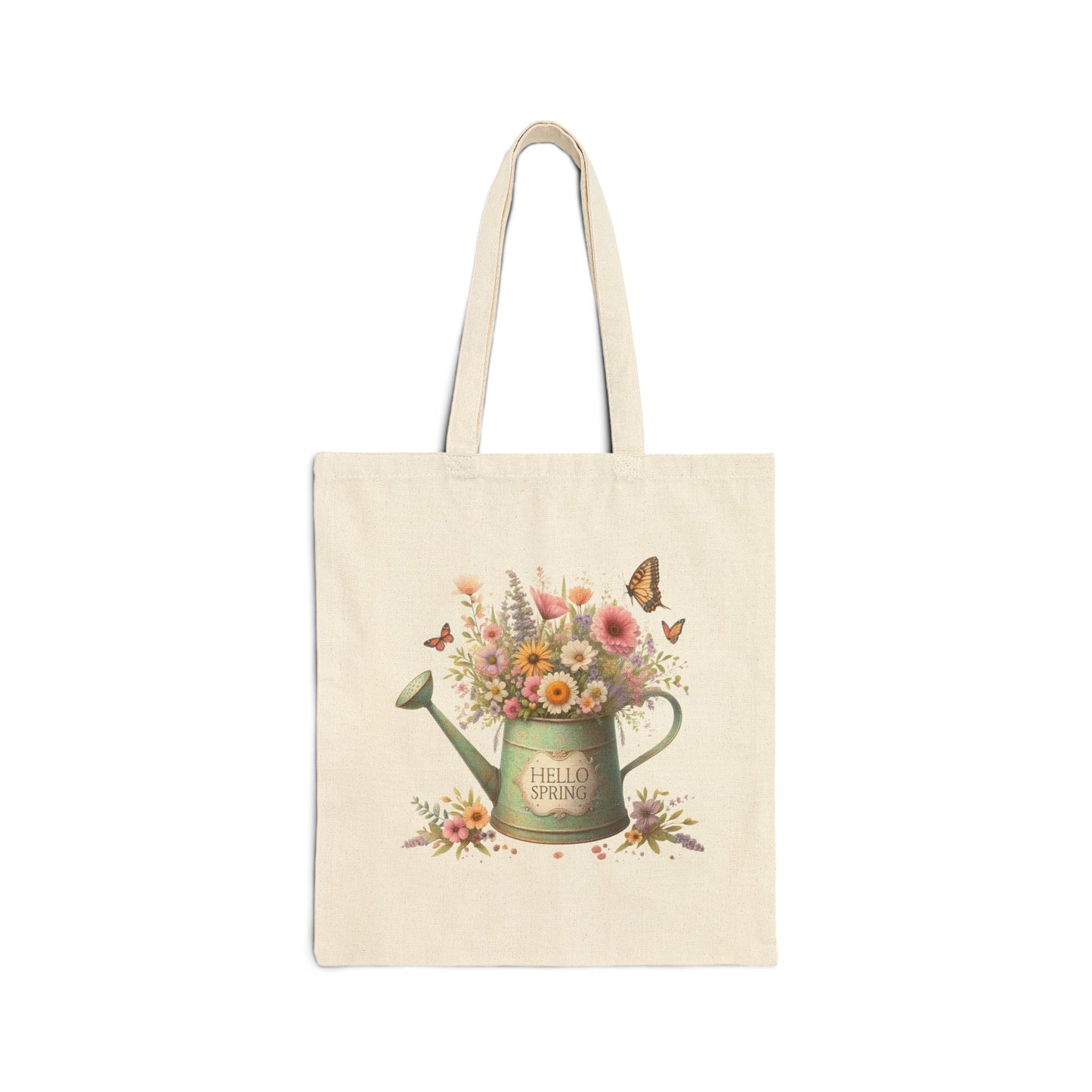 Canvas tote bag with a "Hello Spring" print featuring a vintage watering can filled with flowers and surrounded by butterflies.