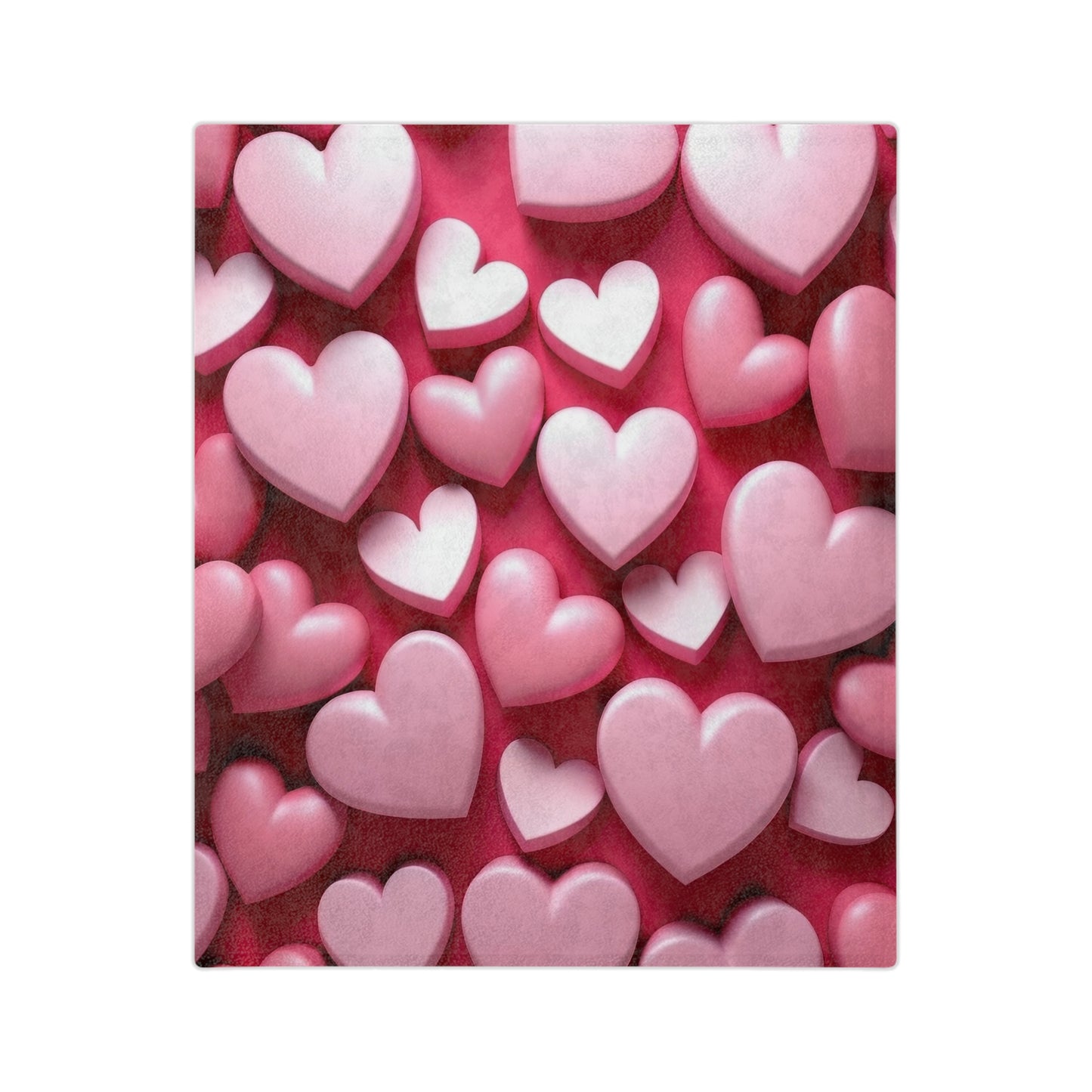 Close-up of a plush blanket showing a textured design of numerous 3D-effect pink and light pink hearts overlapping on a deep red surface, evoking love and warmth."