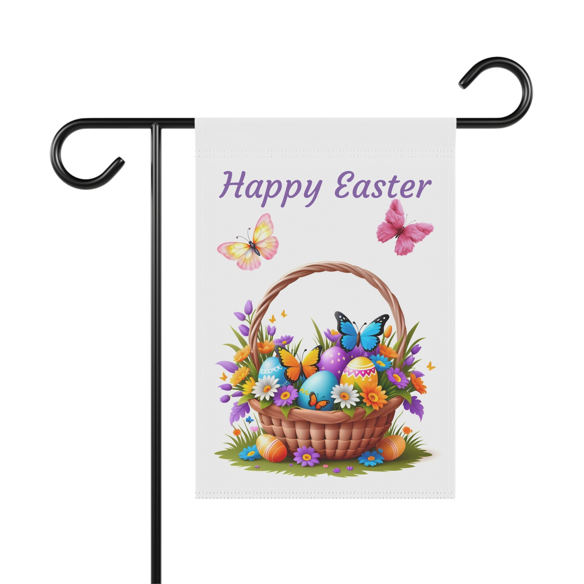 White garden flag with the text "Happy Easter" in purple, featuring a brown woven Easter basket overflowing with colorful patterned eggs and spring flowers, with pink and yellow butterflies flying above and blue butterflies near the basket. The flag is displayed on a black metal garden flag stand.