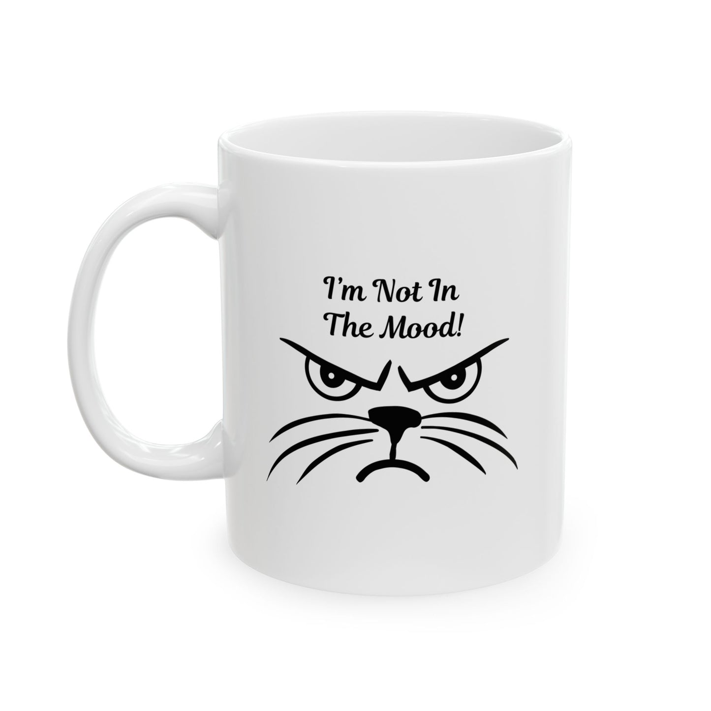 White ceramic coffee mug with a grumpy black cat face and the text "I'm Not In The Mood!".