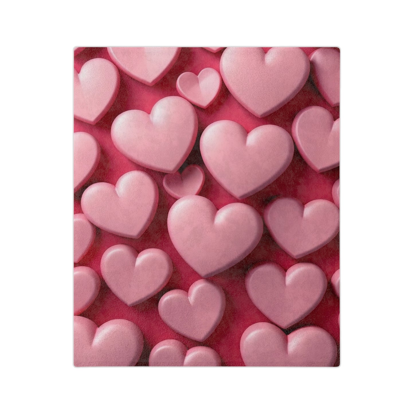 "Close-up of a cozy blanket showing numerous 3D-effect light and dark pink hearts layered on a rich crimson red surface, creating a romantic and tactile design."