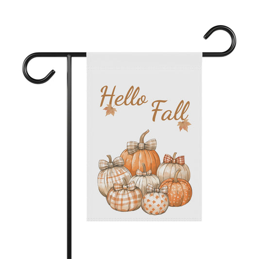 White garden flag with "Hello Fall" in script, adorned with a group of various orange and patterned pumpkins with bows.