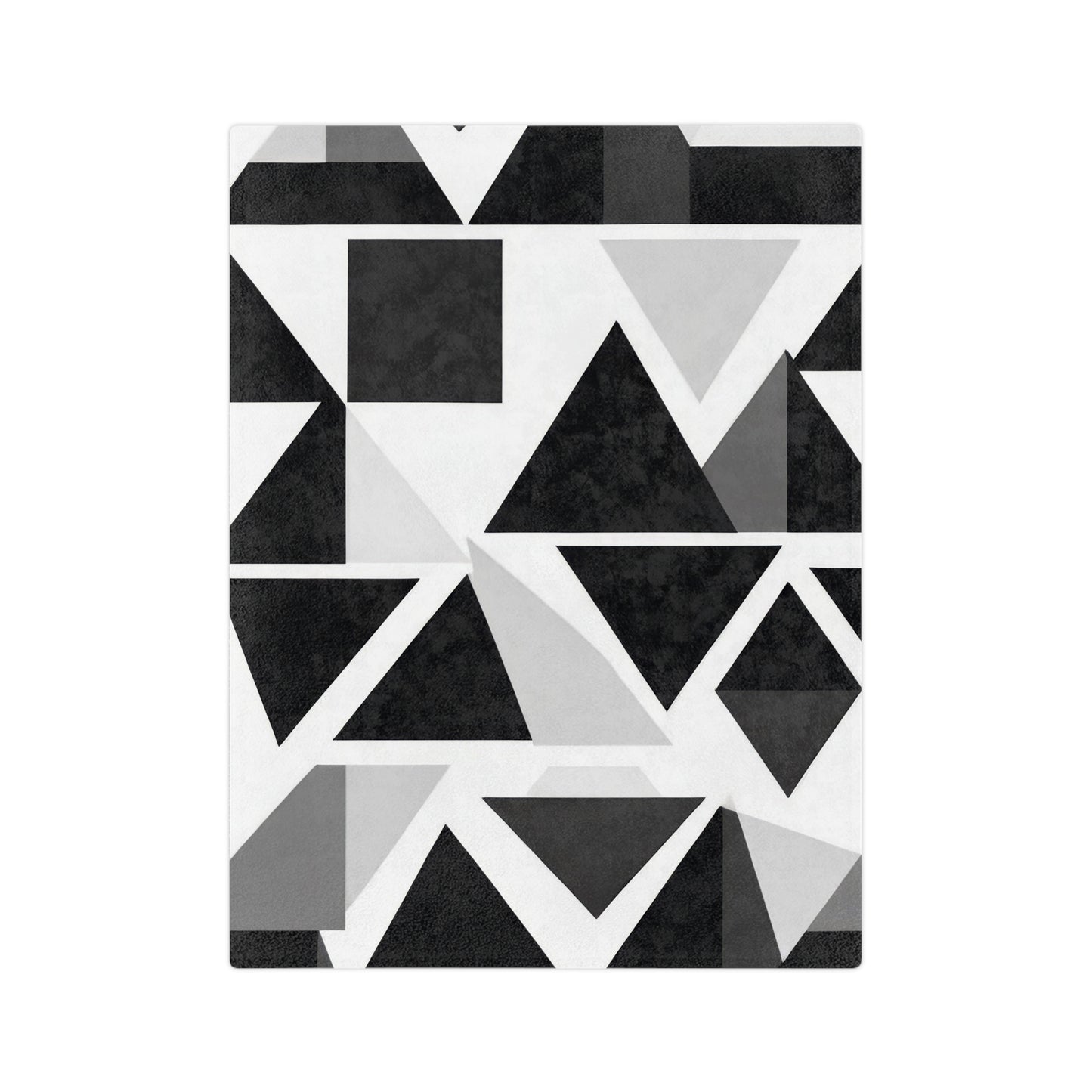 Velveteen plush blanket with a black, white, and gray abstract geometric pattern