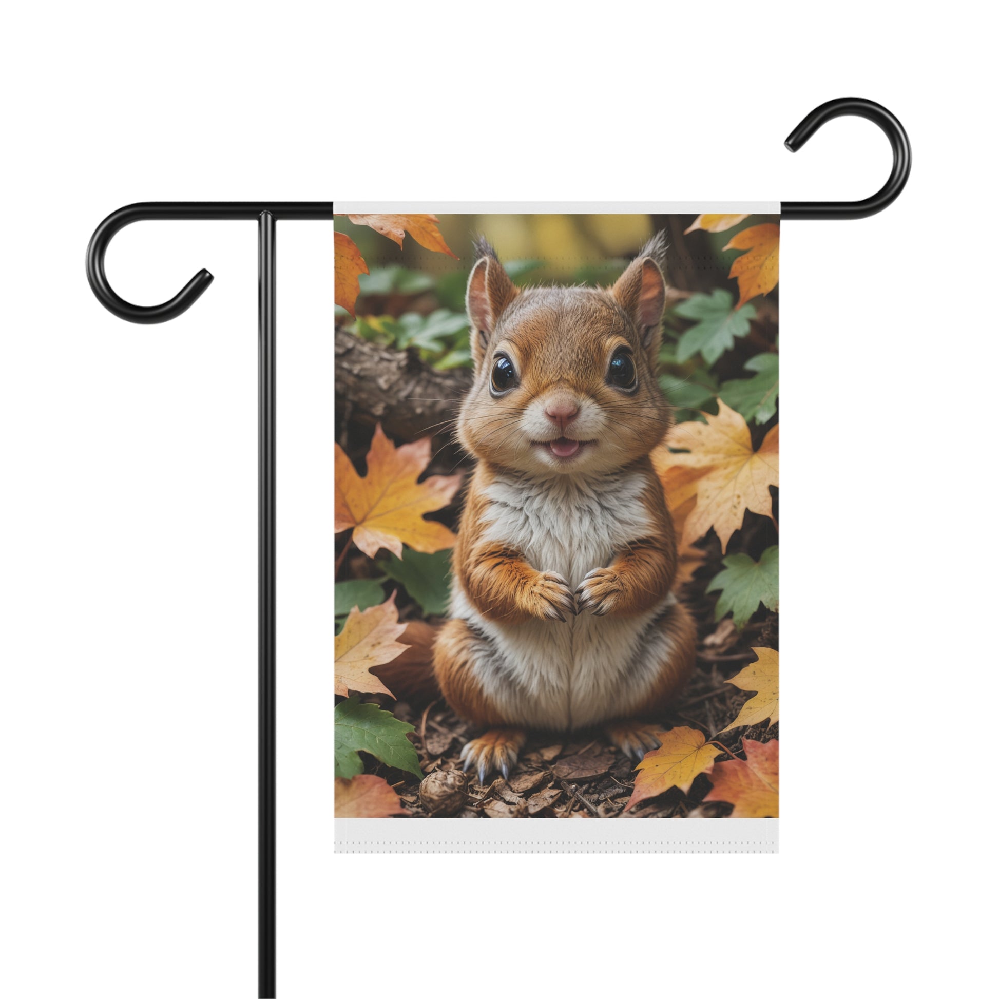 Garden flag with a very cute and fluffy baby squirrel sitting amidst colorful orange and green autumn leaves, with its paws clasped and a tiny smile.