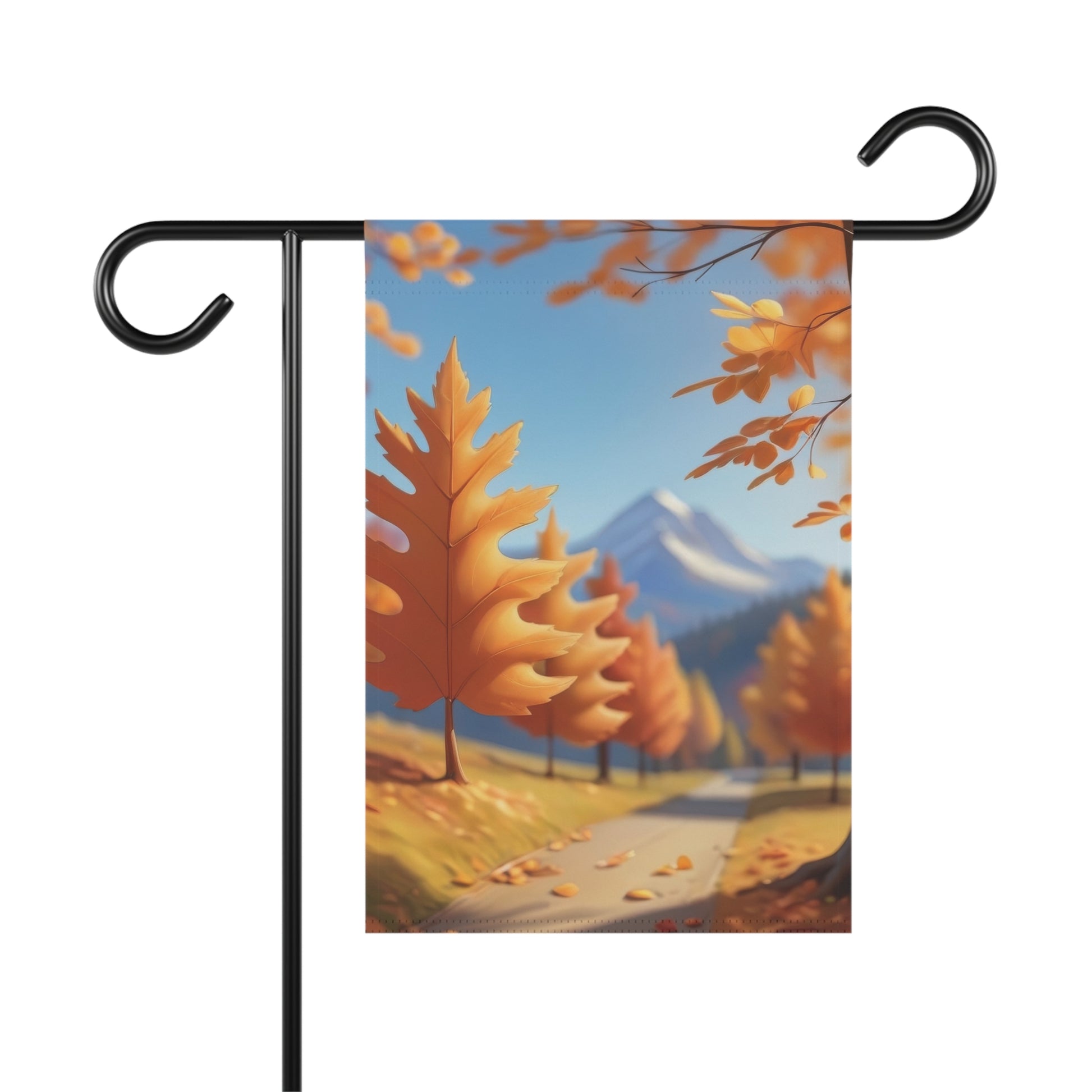 Garden flag depicting a vibrant autumn landscape with orange leaves on trees, a road, and snow-capped mountains under a blue sky.