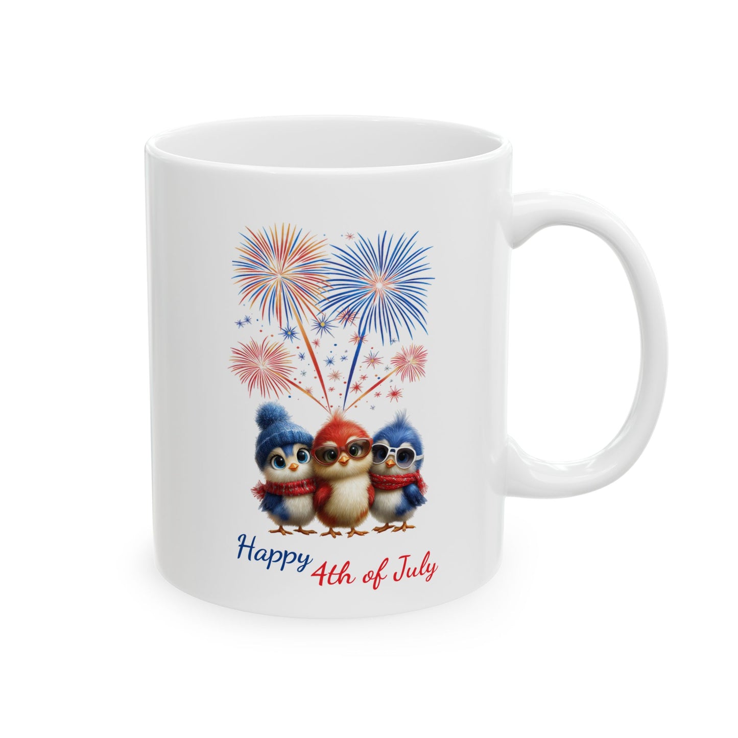White ceramic coffee mug with a sleepy kitten wearing a patriotic hat and surrounded by red, white, and blue fireworks.