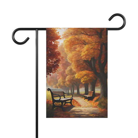 Garden flag featuring a golden autumn park path with two park benches and vibrant orange and yellow fall trees.