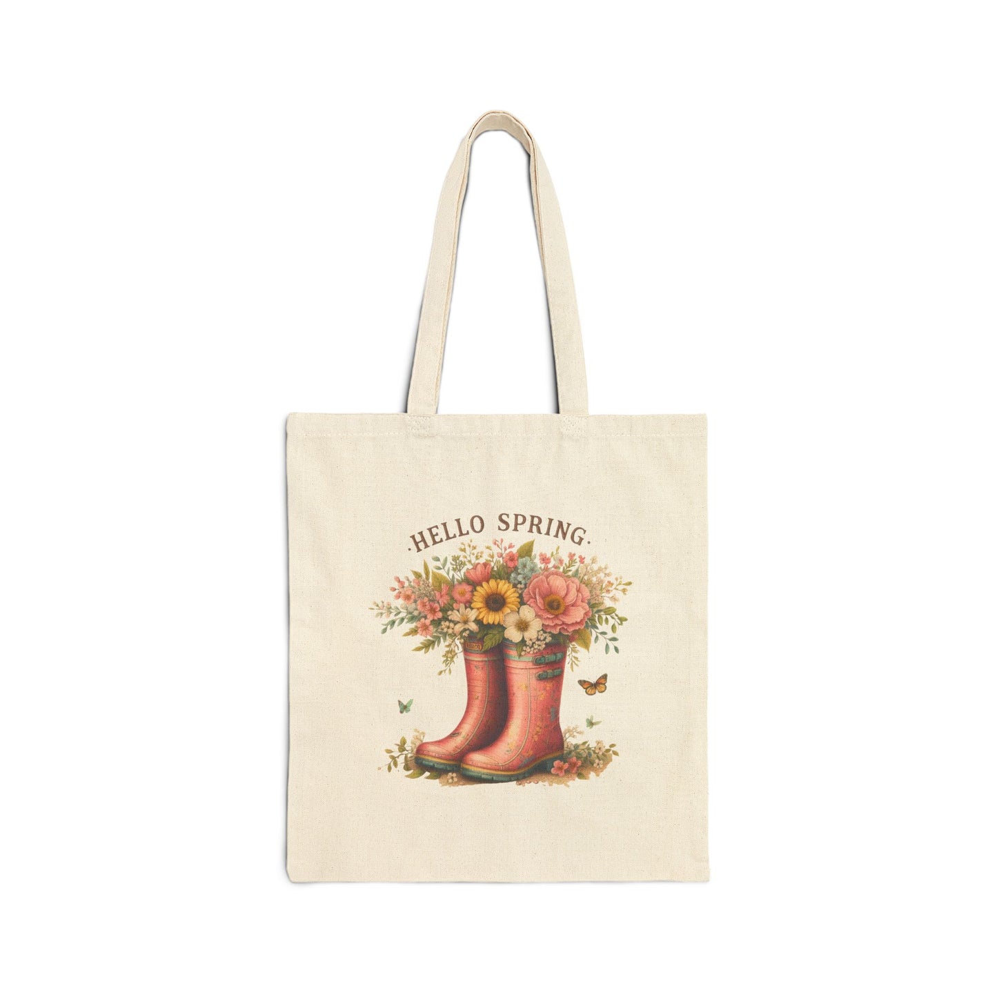 Canvas tote bag with a "Hello Spring" print featuring a pair of pink rain boots filled with a bouquet of flowers.