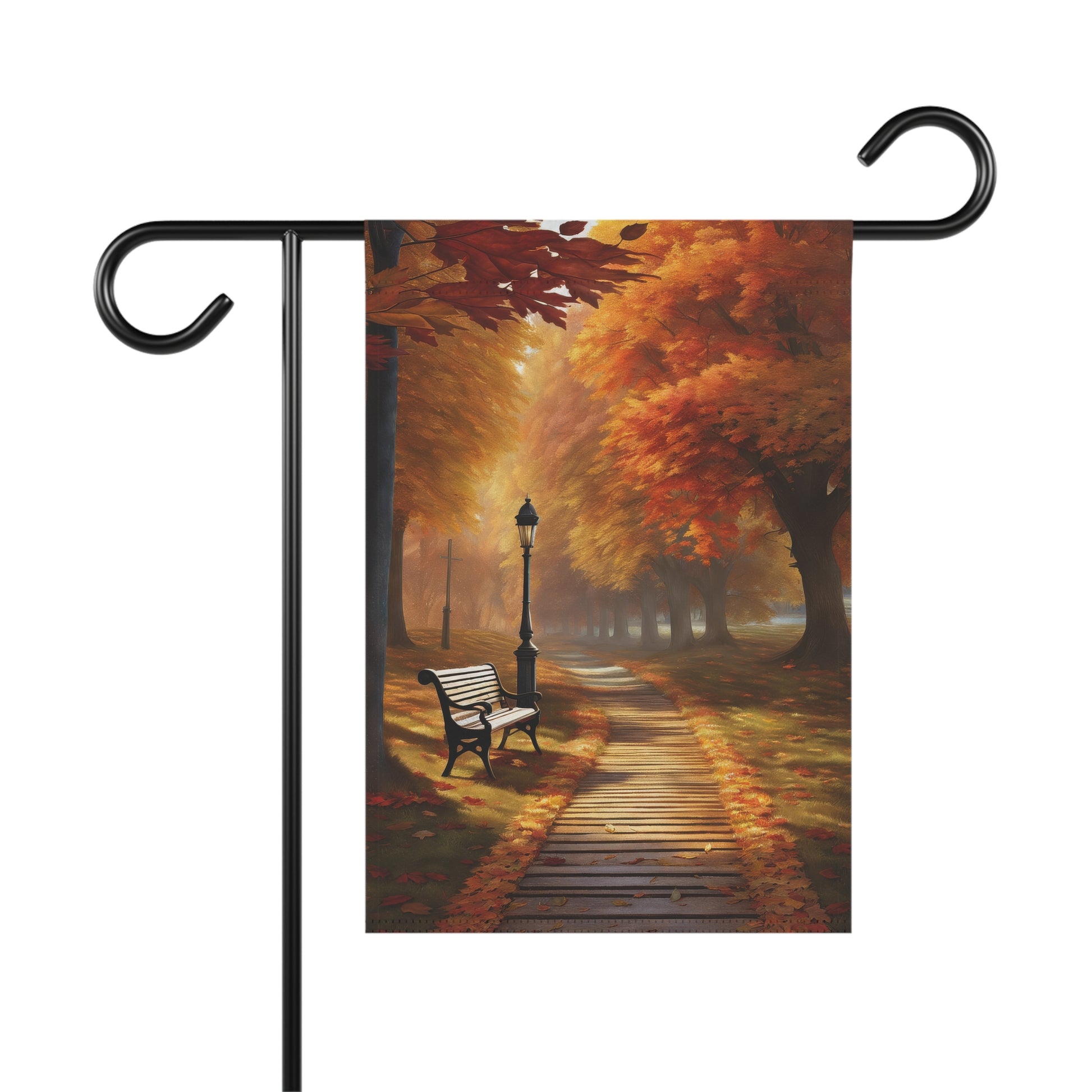 Garden flag showing a rustic autumn park path lined with orange and red fall trees, a street lamp, and a park bench.