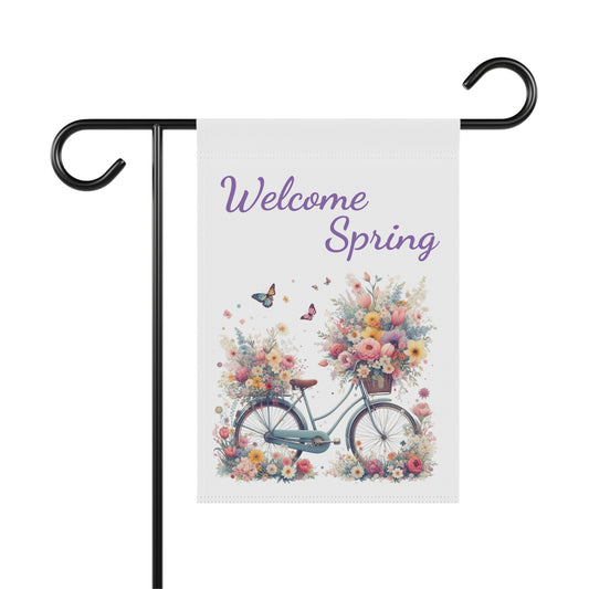 Welcome Spring" garden flag with a vintage bicycle overflowing with a colorful bouquet of watercolor flowers and flying butterflies.