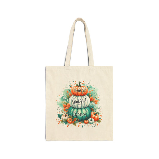 Thankful Grateful Blessed canvas tote bag featuring a watercolor pumpkin stack in shades of orange and green