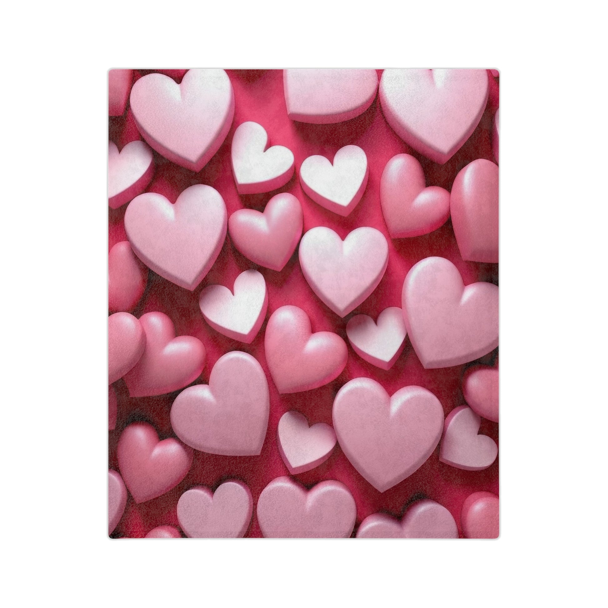 Close-up of a plush blanket showing a textured design of numerous 3D-effect pink and light pink hearts overlapping on a deep red surface, evoking love and warmth."