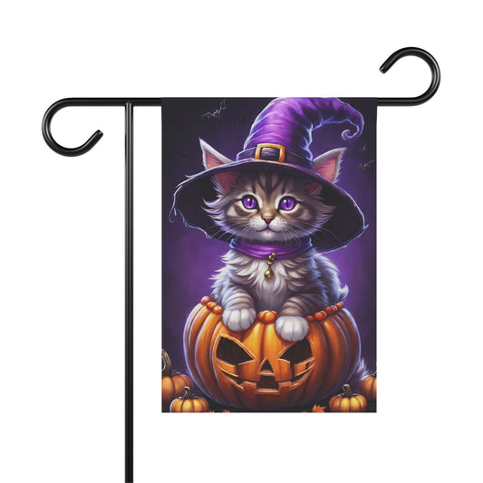 Adorable kitten wearing a purple witch hat sitting inside a carved pumpkin on a Halloween garden flag with purple background and bats
