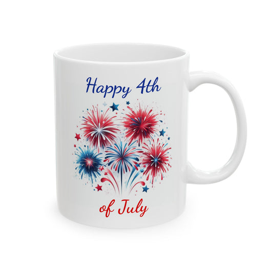 White ceramic coffee mug featuring a cluster of five red, white, and blue fireworks with scattered stars between the blue script text Happy 4th at the top and red script text of July at the bottom.