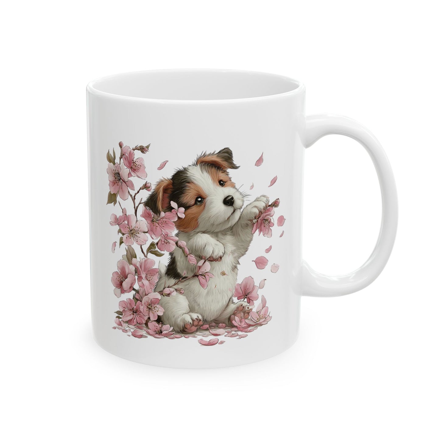 Cute small tricolor puppy playing with pink cherry blossom flowers on a ceramic coffee mug