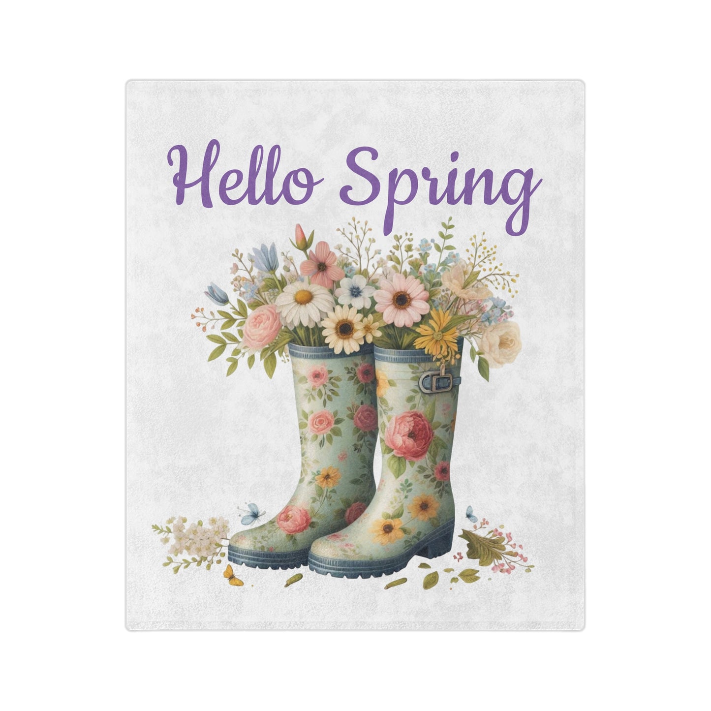 A soft "Hello Spring" velveteen blanket featuring a watercolor illustration of floral rain boots filled with a bouquet of spring flowers.

