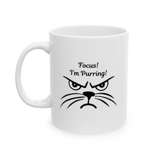 White ceramic coffee mug with "Focus! I'm Purring!" text and a grumpy cat face, Funny cat lover mug, Grumpy cat meme mug.