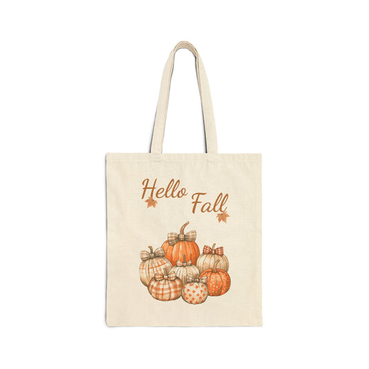 Hello Fall canvas tote bag with a watercolor-style illustration of a group of decorative pumpkins with plaid and polka dot patterns