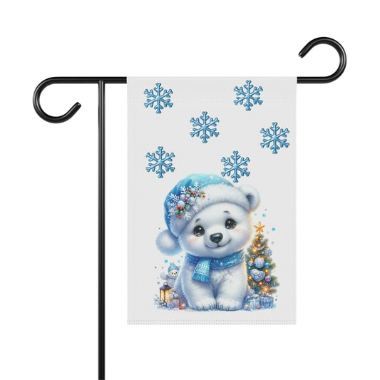 Cute cartoon baby polar bear garden flag wearing a blue hat and scarf, sitting next to a decorated Christmas tree with gifts and blue snowflakes, festive holiday outdoor decor.

