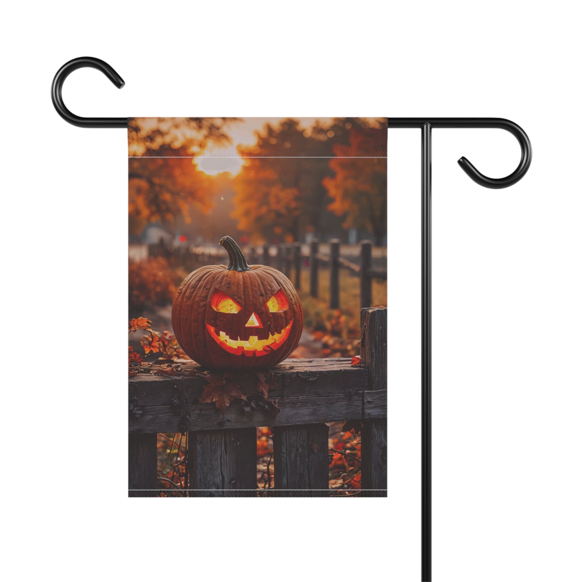 “Glowing jack-o’-lantern on rustic wooden fence at sunset – Halloween garden flag with autumn background”
