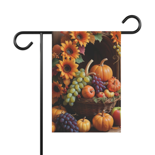 Thanksgiving garden flag with harvest basket of pumpkins, grapes, apples, and sunflowers on a rustic background
