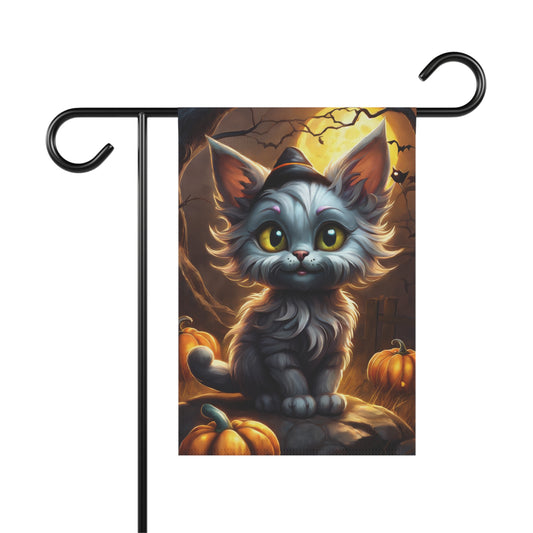 Cartoon Halloween garden flag with cute gray kitten in witch hat sitting among pumpkins under full moon