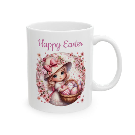 White ceramic coffee mug with a charming illustration of a girl in a hat holding a basket of Easter eggs, surrounded by a pink floral wreath, and the text "Happy Easter."

