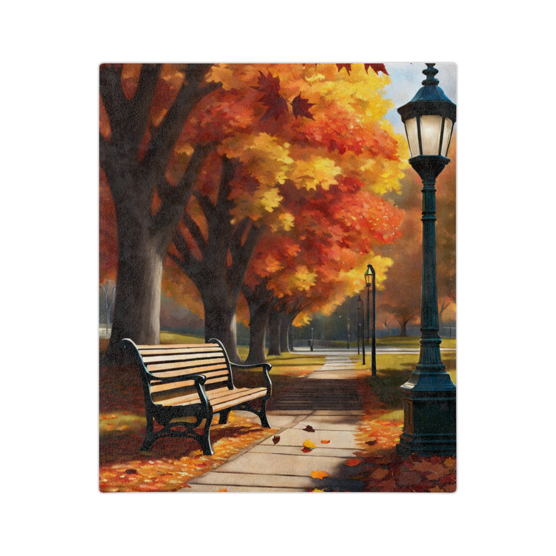 Lightweight velveteen blanket depicting a vibrant autumn park scene with a path, a large black streetlamp, a green park bench in the foreground, and trees with orange and red fall leaves.


