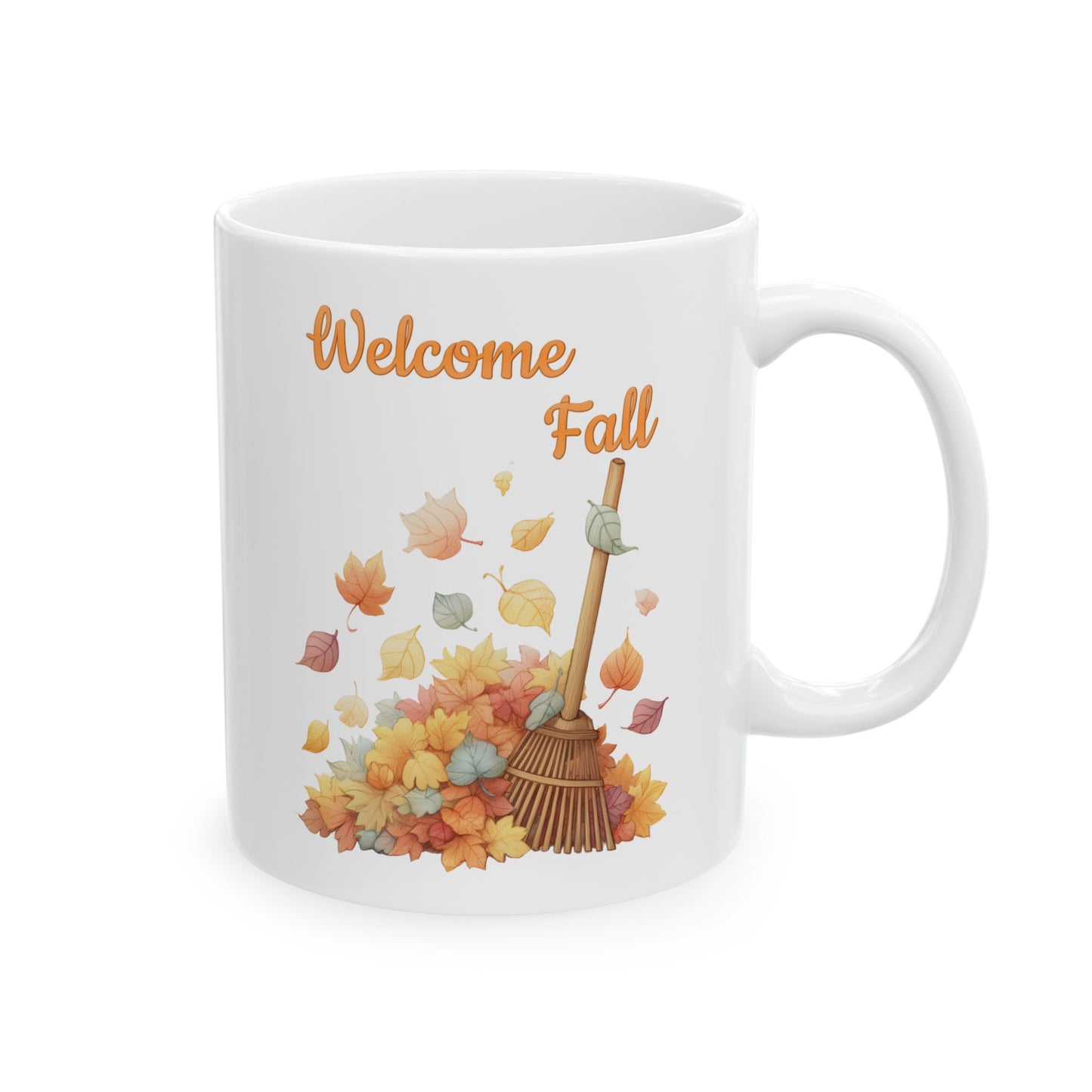 White ceramic coffee mug featuring a soft illustration of a wooden rake leaning against a pile of colorful autumn leaves under the words Welcome Fall.