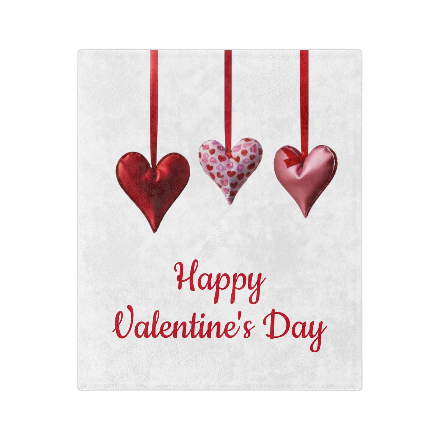 "Soft white blanket displaying a design of three distinct hearts – one red, one patterned pink, and one solid pink with a bow – suspended from red ribbons, with a 'Happy Valentine's Day' message below, perfect for a romantic gift."