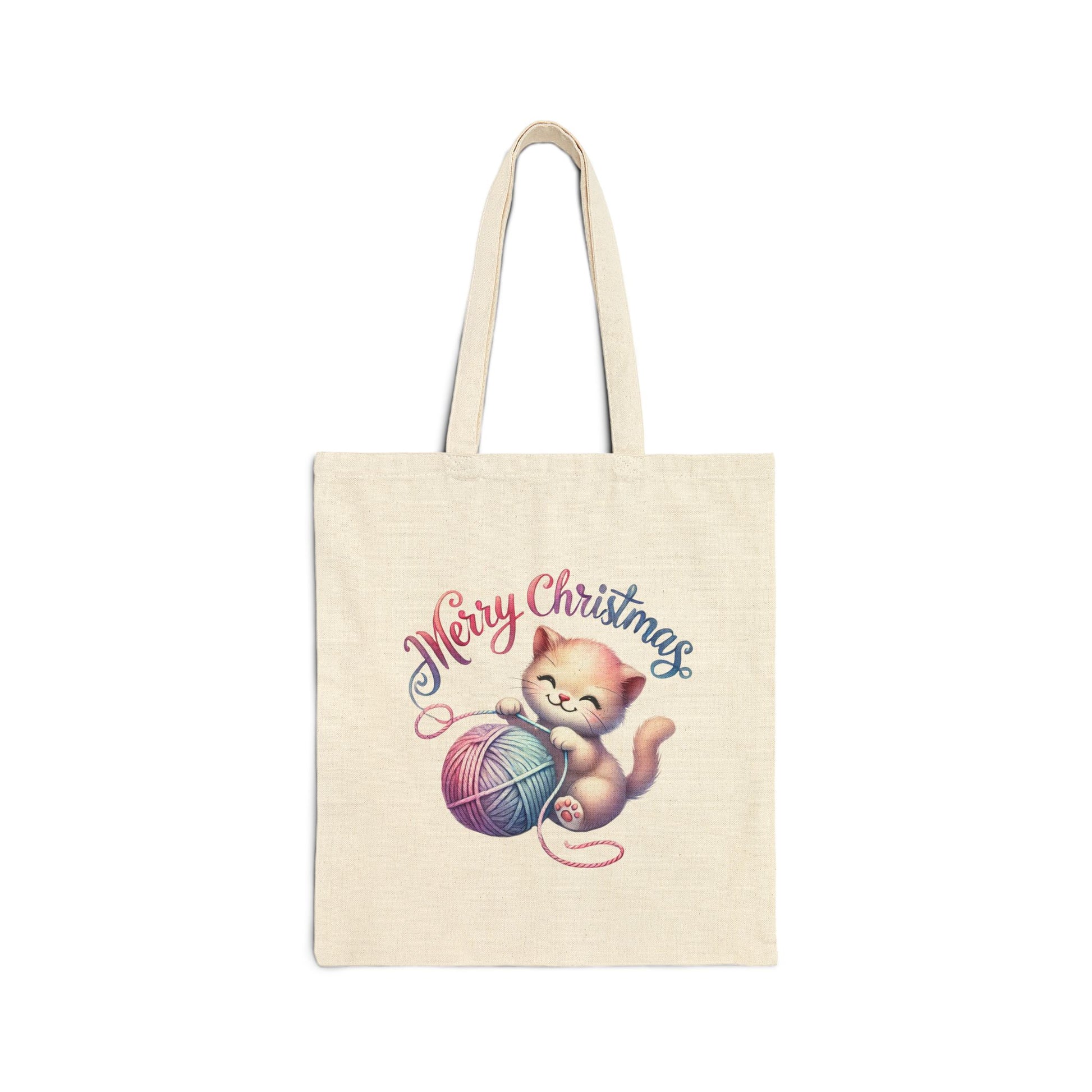 Canvas tote bag with a cute kitten playing with a yarn ball and "Merry Christmas" text