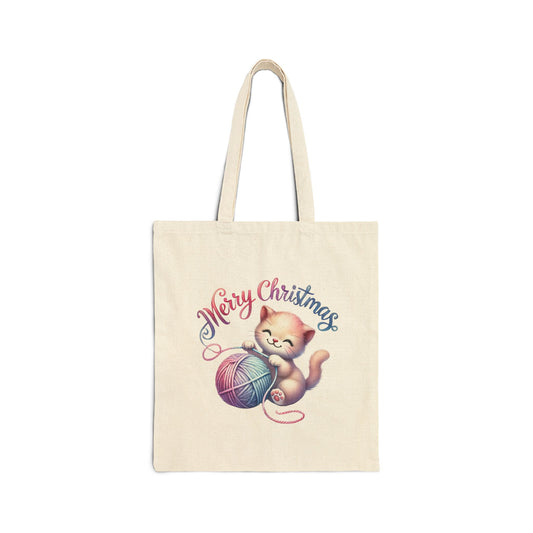 Canvas tote bag with a cute kitten playing with a yarn ball and "Merry Christmas" text