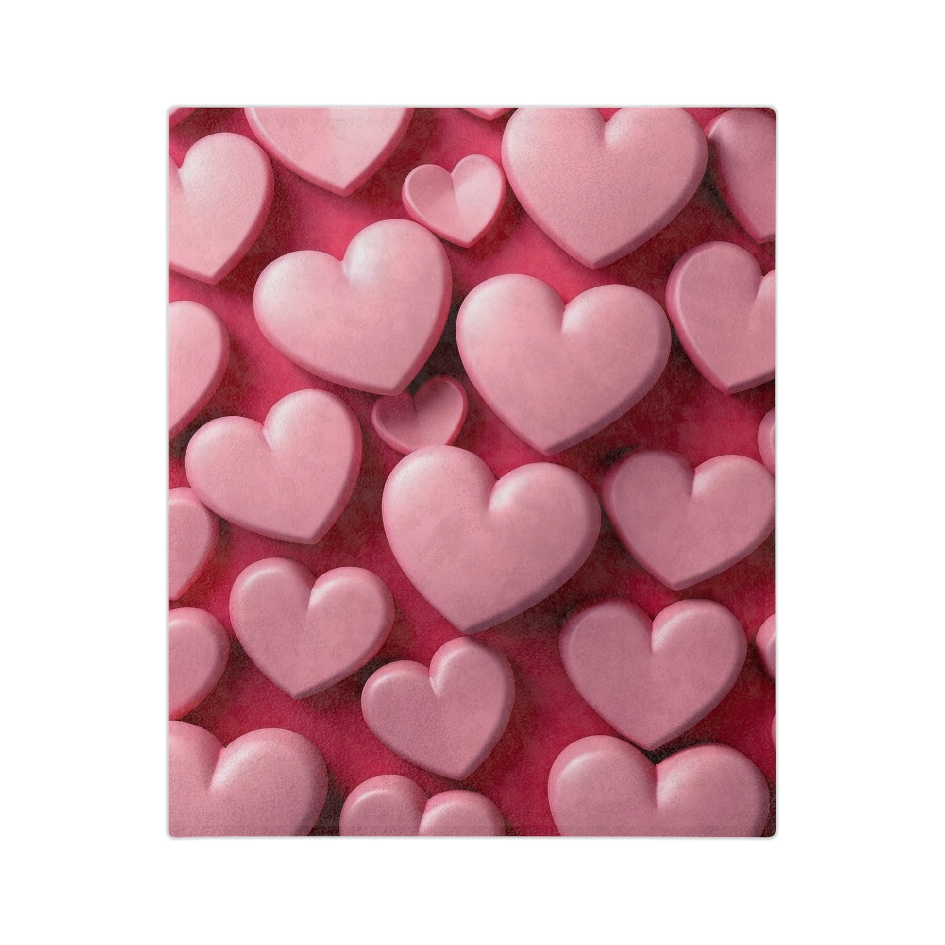 "Close-up of a cozy blanket showing numerous 3D-effect light and dark pink hearts layered on a rich crimson red surface, creating a romantic and tactile design."
