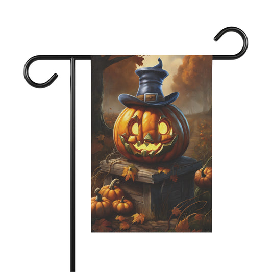 Halloween garden flag with glowing jack-o'-lantern wearing witch hat surrounded by pumpkins and autumn leaves