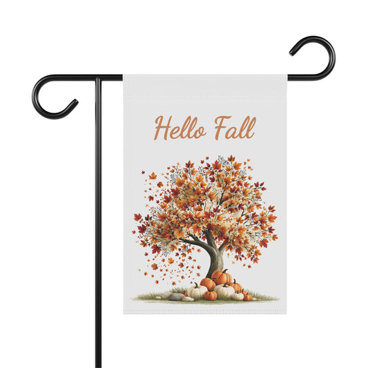 Outdoor garden flag featuring an autumn tree illustration with orange text reading Hello Fall.