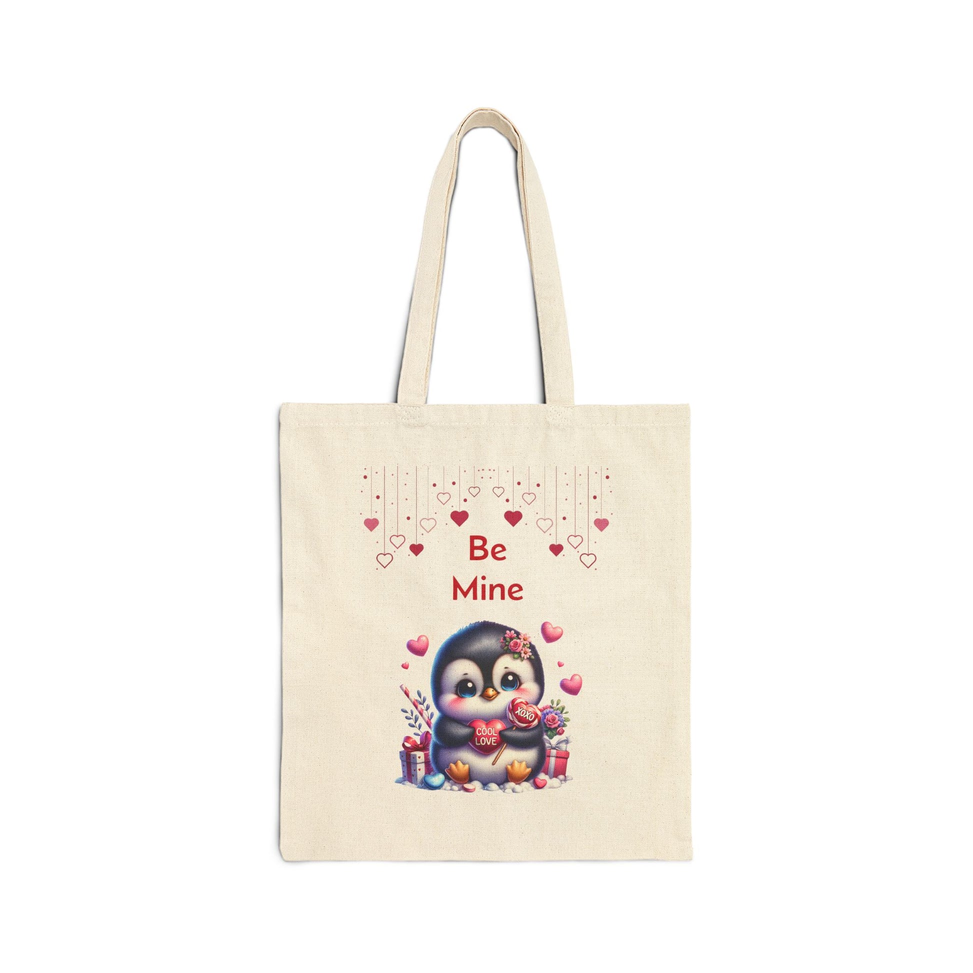 "Be Mine" canvas tote bag with a cute penguin holding a heart candy that says "I LUV U."