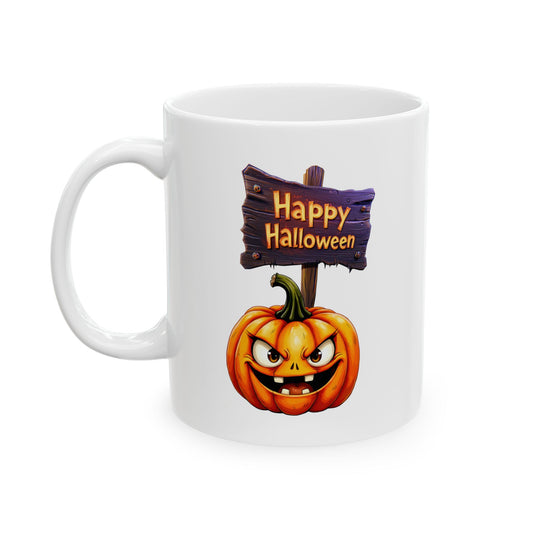 White ceramic coffee mug with an illustration of a dark wooden sign on a post reading 'Happy Halloween' in orange letters, above a large, grinning orange jack-o'-lantern with sharp teeth and yellow eyes