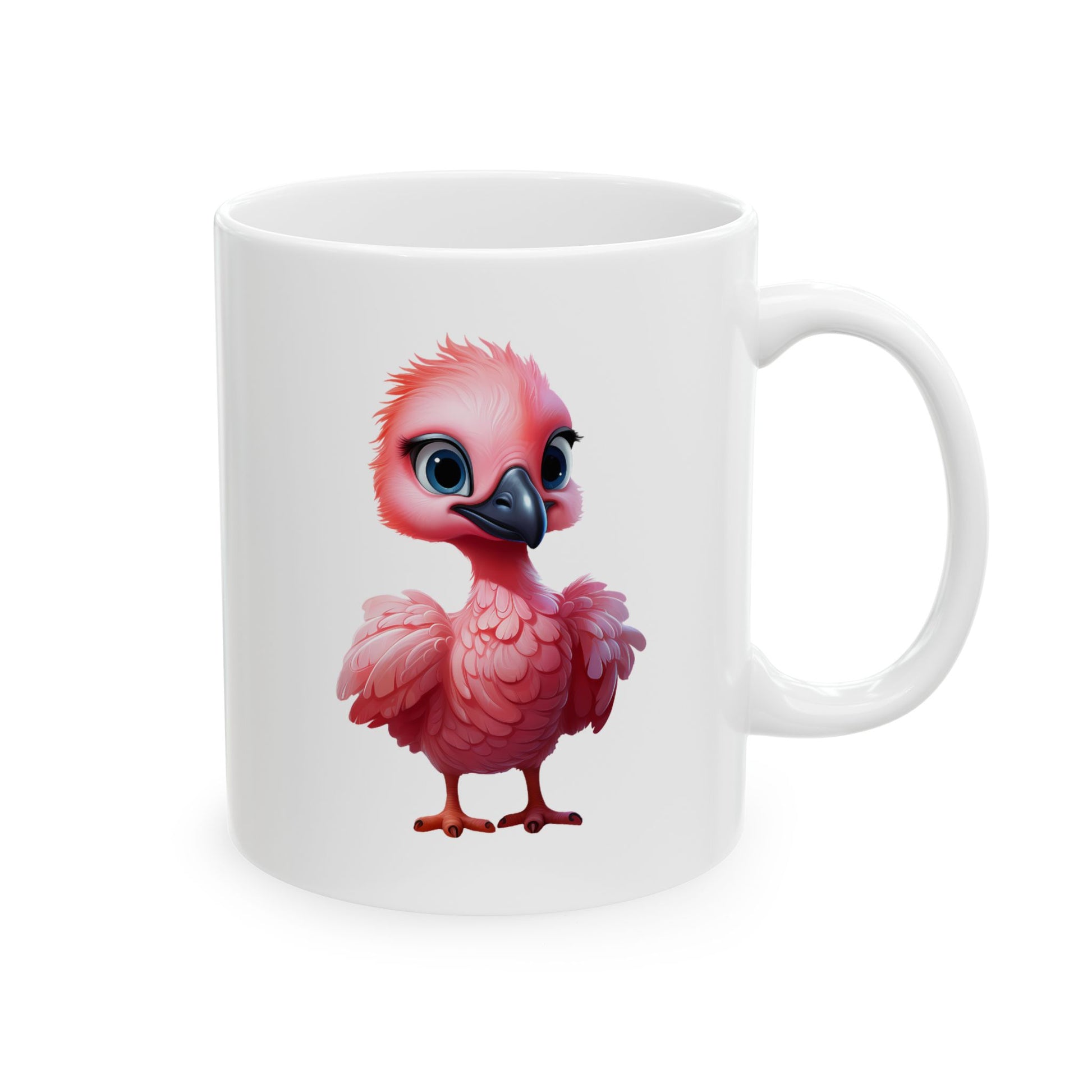 White ceramic coffee mug with a cute, cartoon-style graphic of a baby flamingo with big eyes.