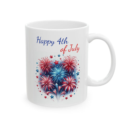 White ceramic coffee mug featuring a tight cluster of red, white, and blue fireworks surrounded by small scattered stars beneath the script text Happy 4th of July.