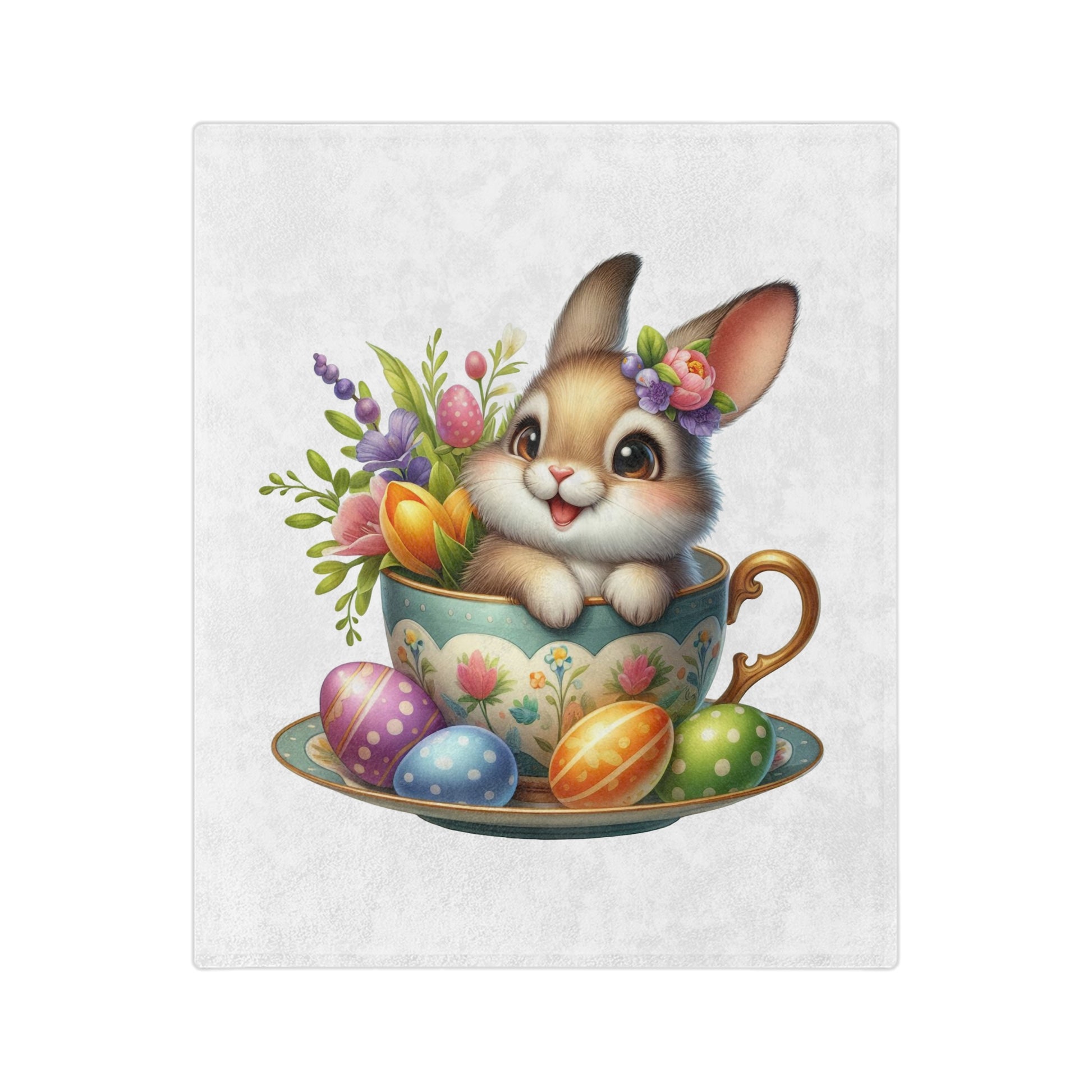 "Close-up of a lightweight velveteen blanket featuring an adorable cartoon brown and white bunny with big eyes and a happy expression, peeking out of a turquoise teacup with gold accents and a floral pattern. The bunny has a small flower crown on its head. Around the teacup on the saucer are colorful Easter eggs (purple, blue, orange, green), and a bouquet of purple and orange flowers is behind the bunny in the teacup. 