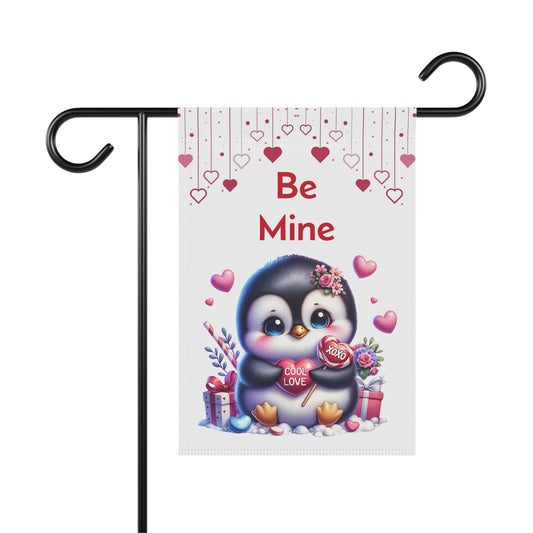Valentine’s Day garden flag with cute baby penguin holding heart lollipops, pink hearts, and "Be Mine" text on white background