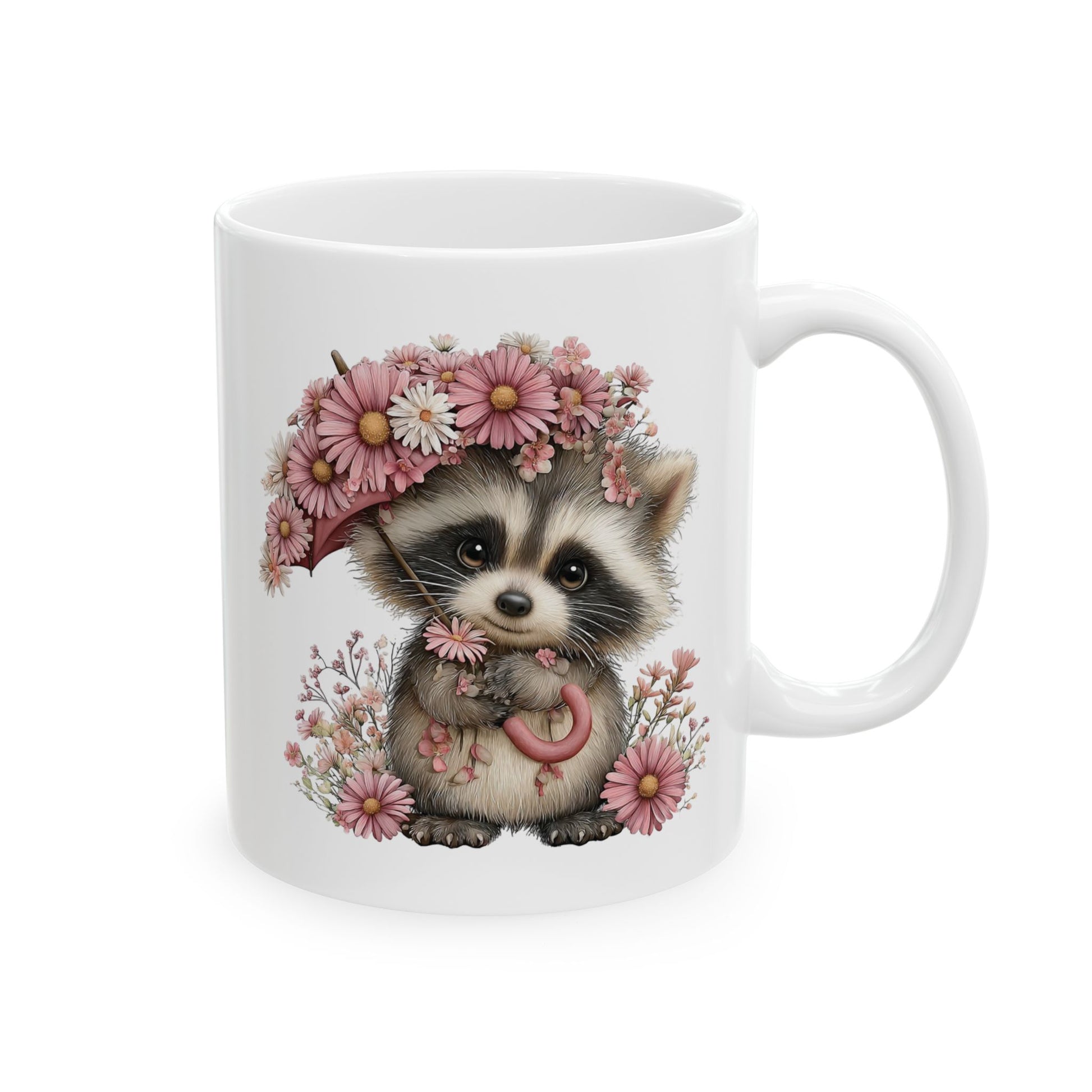 Cute baby raccoon holding a pink daisy floral umbrella on a white ceramic coffee mug
