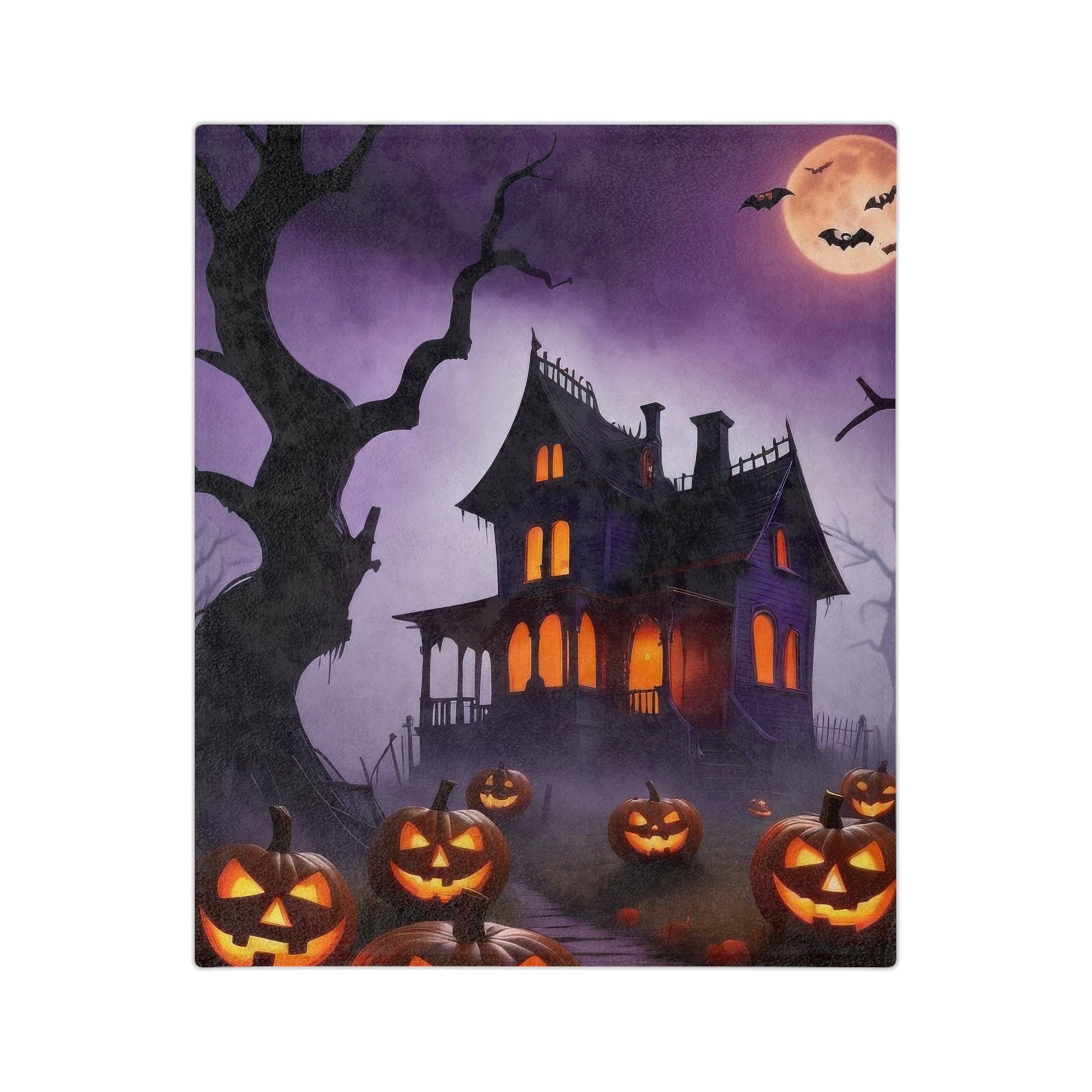 Lightweight velveteen blanket with a printed design of a spooky haunted house, glowing jack-o'-lanterns, bats, and a full moon in a purple, misty night.