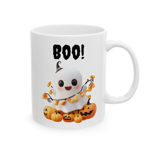 White ceramic mug featuring a cute ghost wrapped in candy corn string lights sitting among jack-o'-lanterns beneath black text reading Boo!