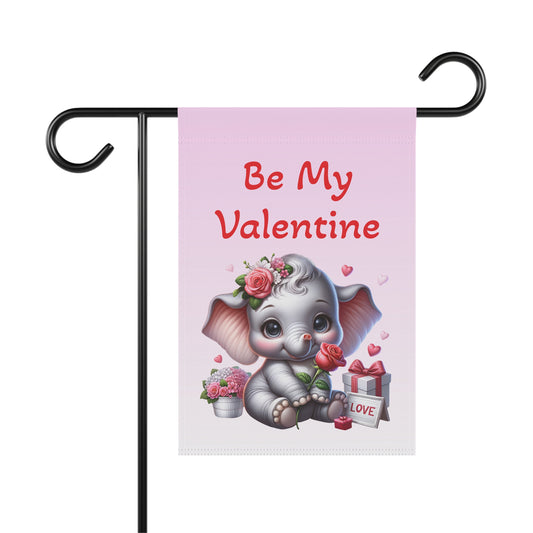 Valentine’s garden flag with baby elephant, pink hearts, roses, and “Be My Valentine” text on soft pink background