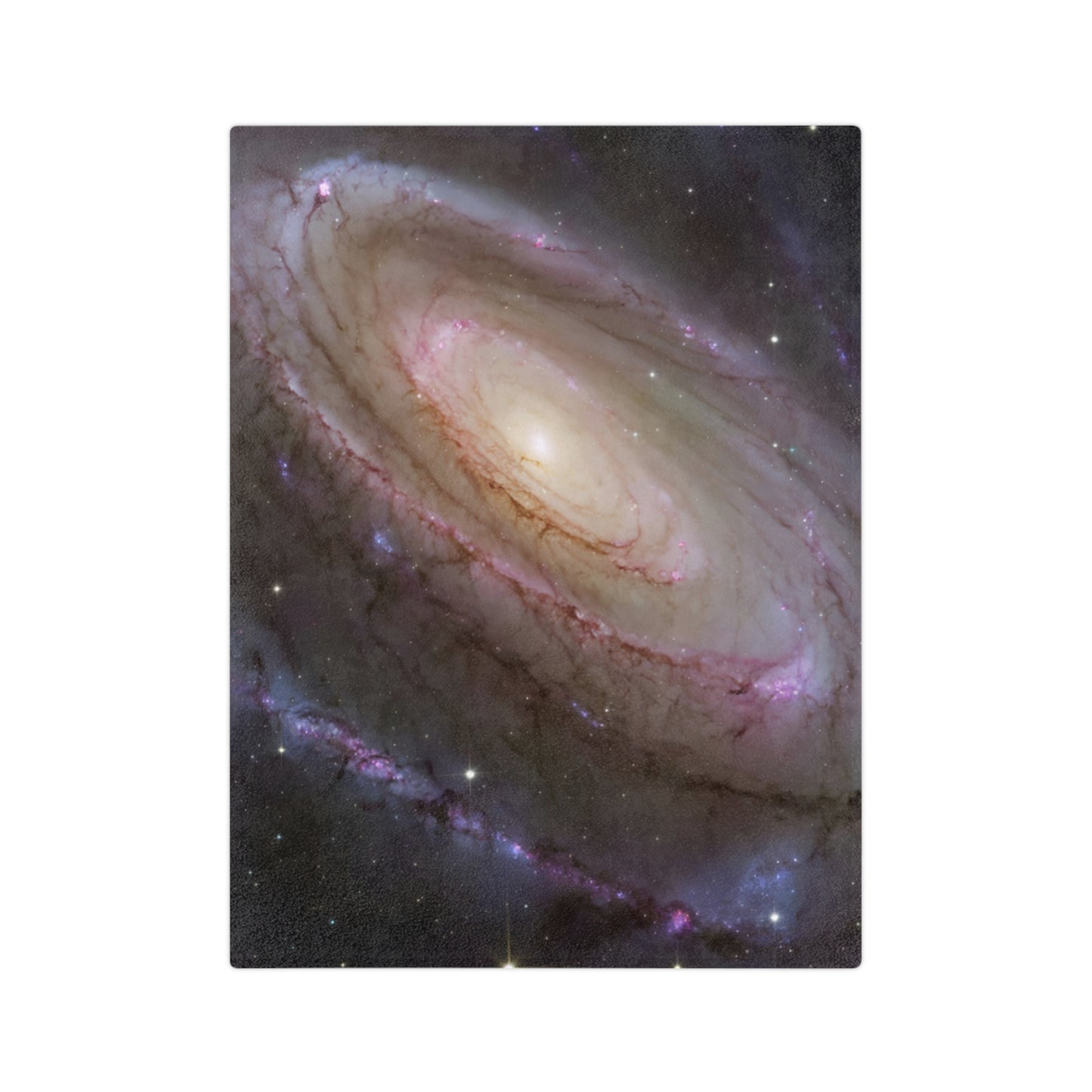 A soft velveteen throw blanket featuring a detailed cosmic galaxy print.