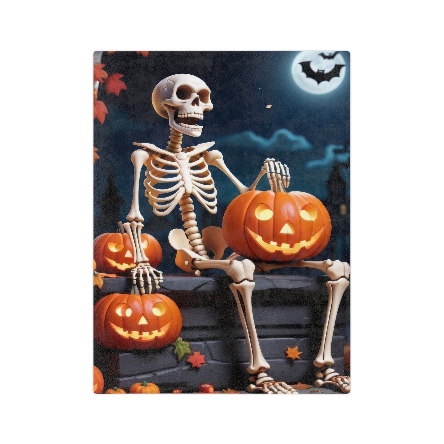 Halloween blanket with a smiling skeleton sitting with glowing jack-o'-lanterns, full moon, and bats, spooky fall decor.


