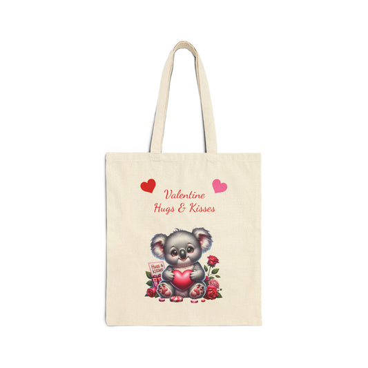 Valentine Hugs & Kisses canvas tote bag with a cute koala bear holding a heart and surrounded by roses.