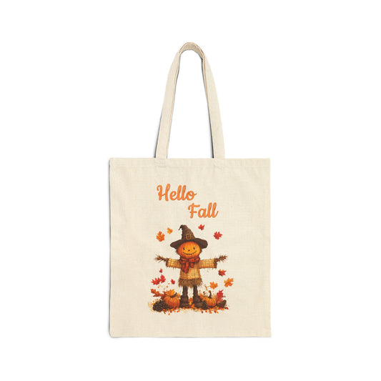 Canvas tote bag with a scarecrow pumpkin and "Hello Fall" text