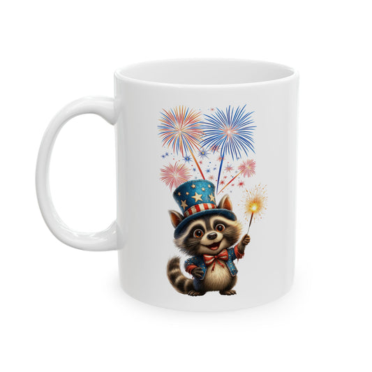White ceramic coffee mug with a cute cartoon raccoon wearing an Uncle Sam hat and jacket, holding a sparkler, with red, white, and blue fireworks in the background
